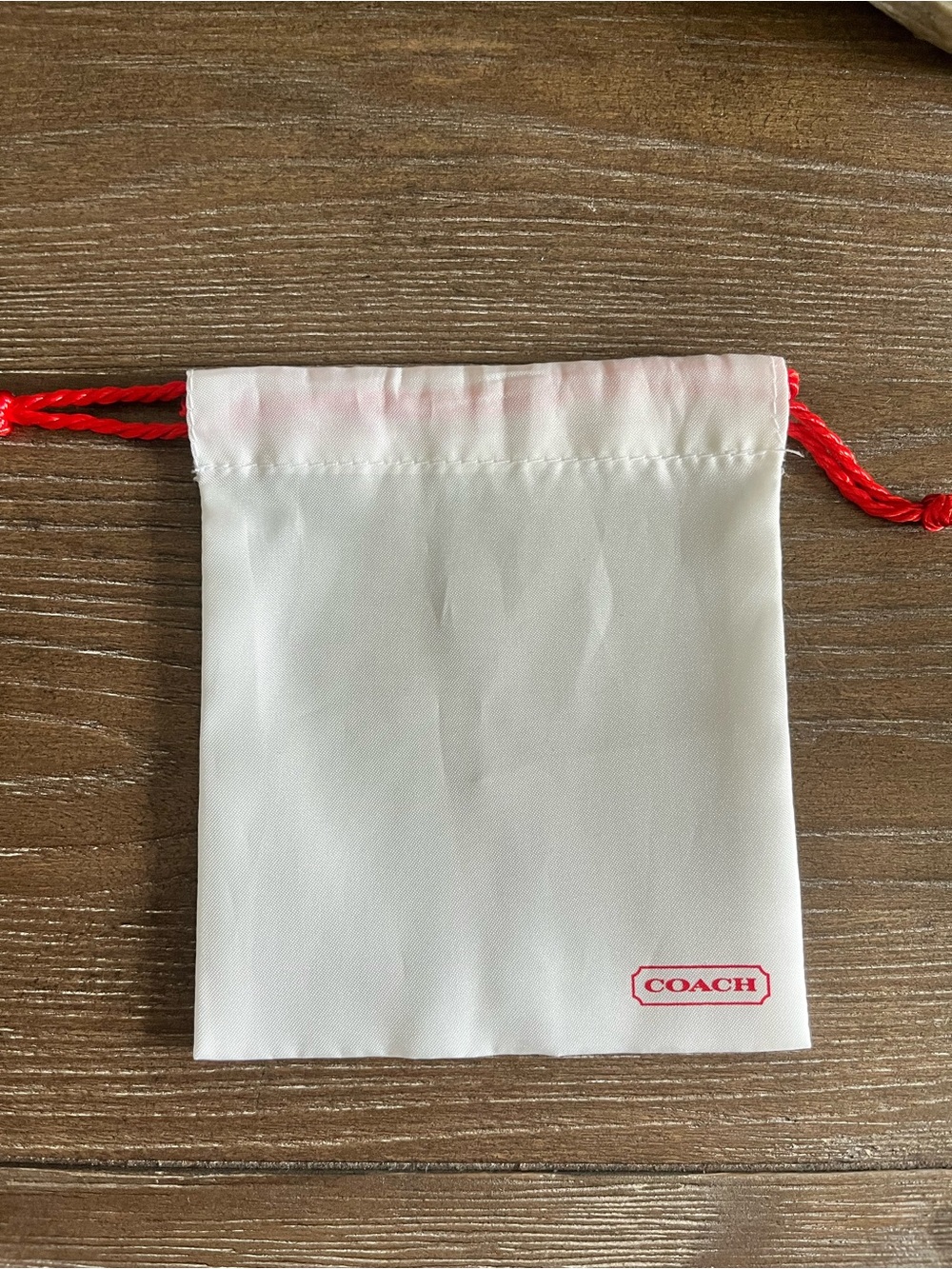 COACH White Drawstring Pouch with Red Accents